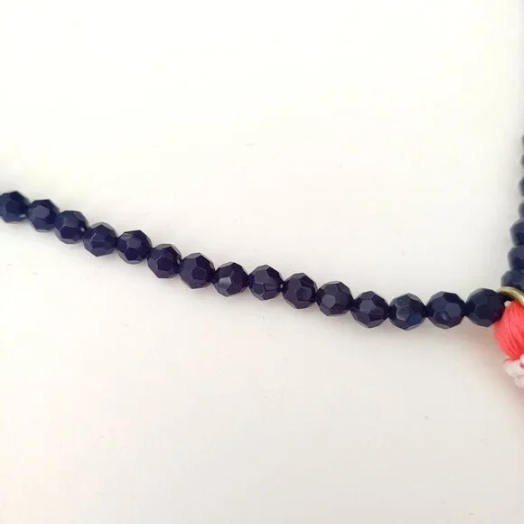 Navy beaded necklace with florescent orange thread tassel - Picture 12 of 12